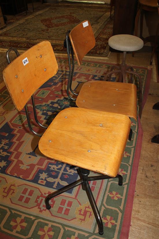 2 swivel metal chairs and a stool